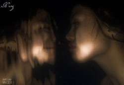 the looking glass by Jun Lao 